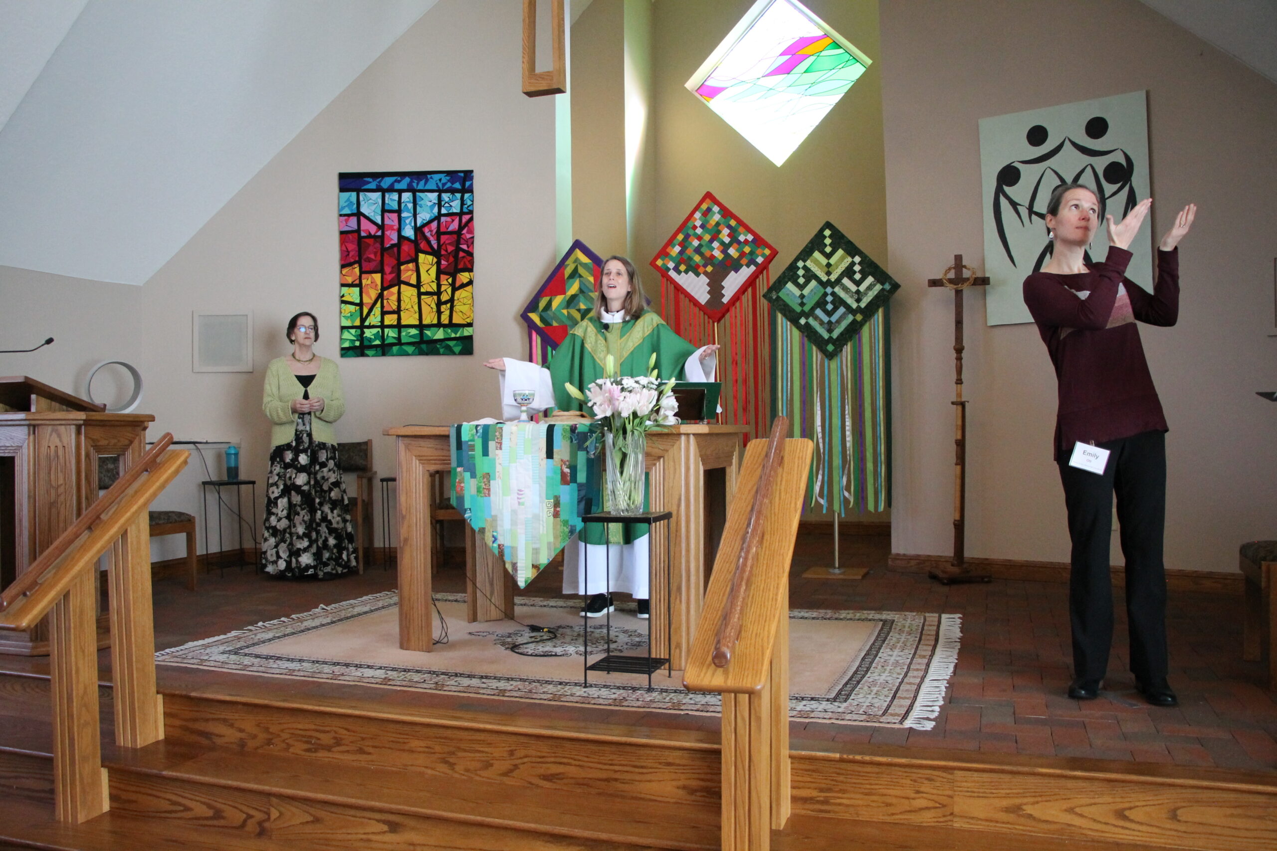 Pastor Kayla Worship Pastor Dave Shull speaking with children sitting on alter steps at Redeemer lutheran church, 1555 S. James Road Columbus, Ohio 43227